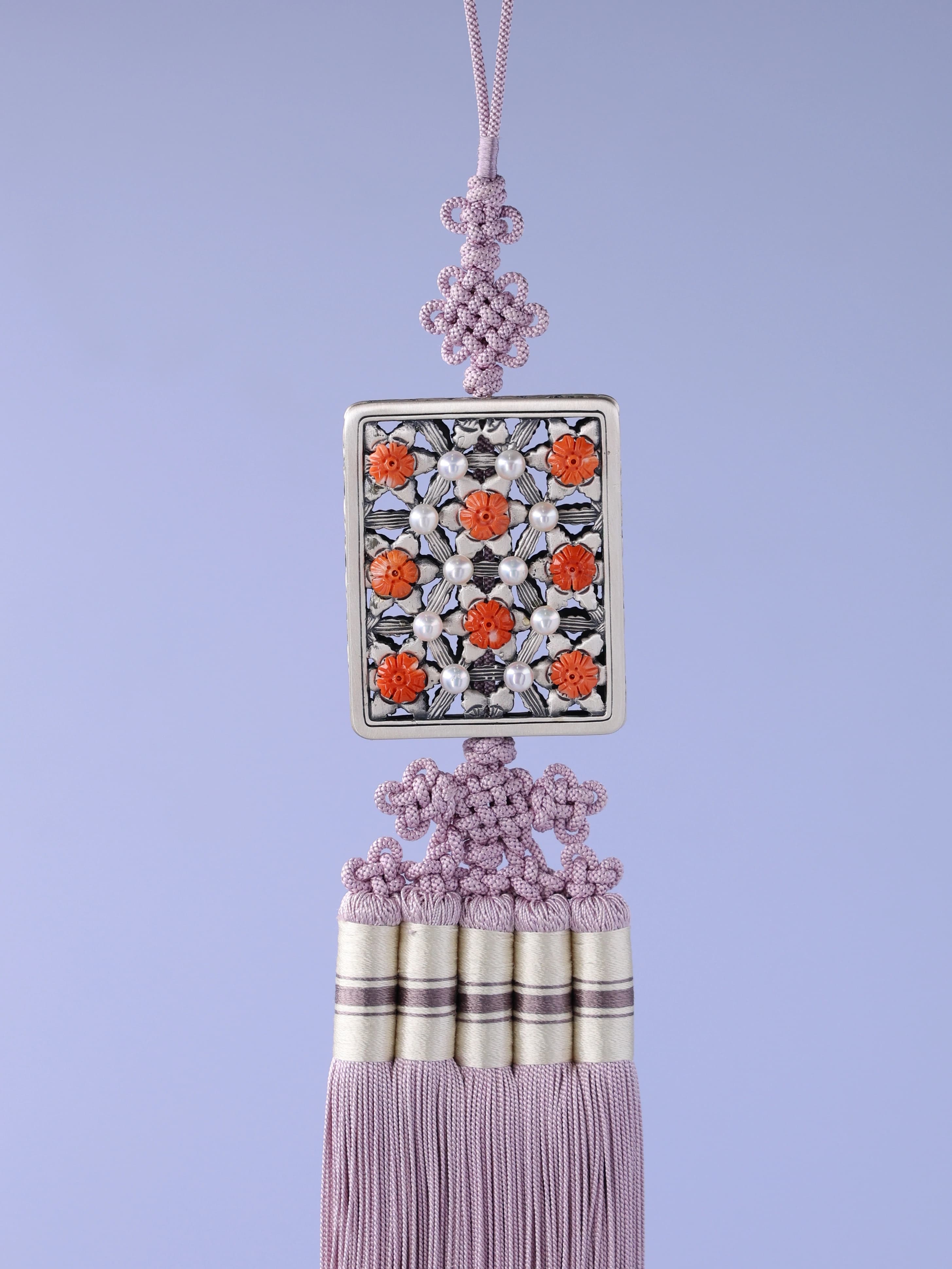 The Danjang norigae with floral details and traditional knots